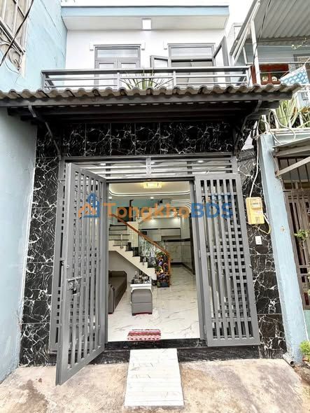 Nhà 1 trệt 1 lầu Tân Phú Quận 7 24m² - Giá tốt hiếm có
